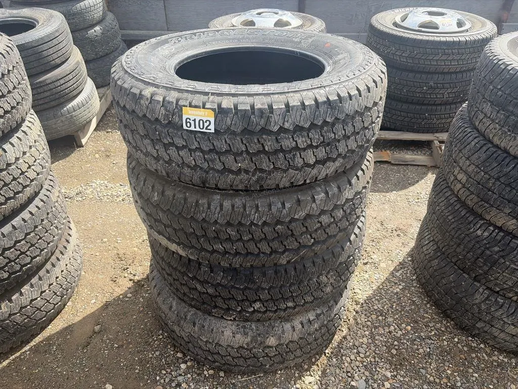 Four Bridgestone Tires - LT275/70R18
