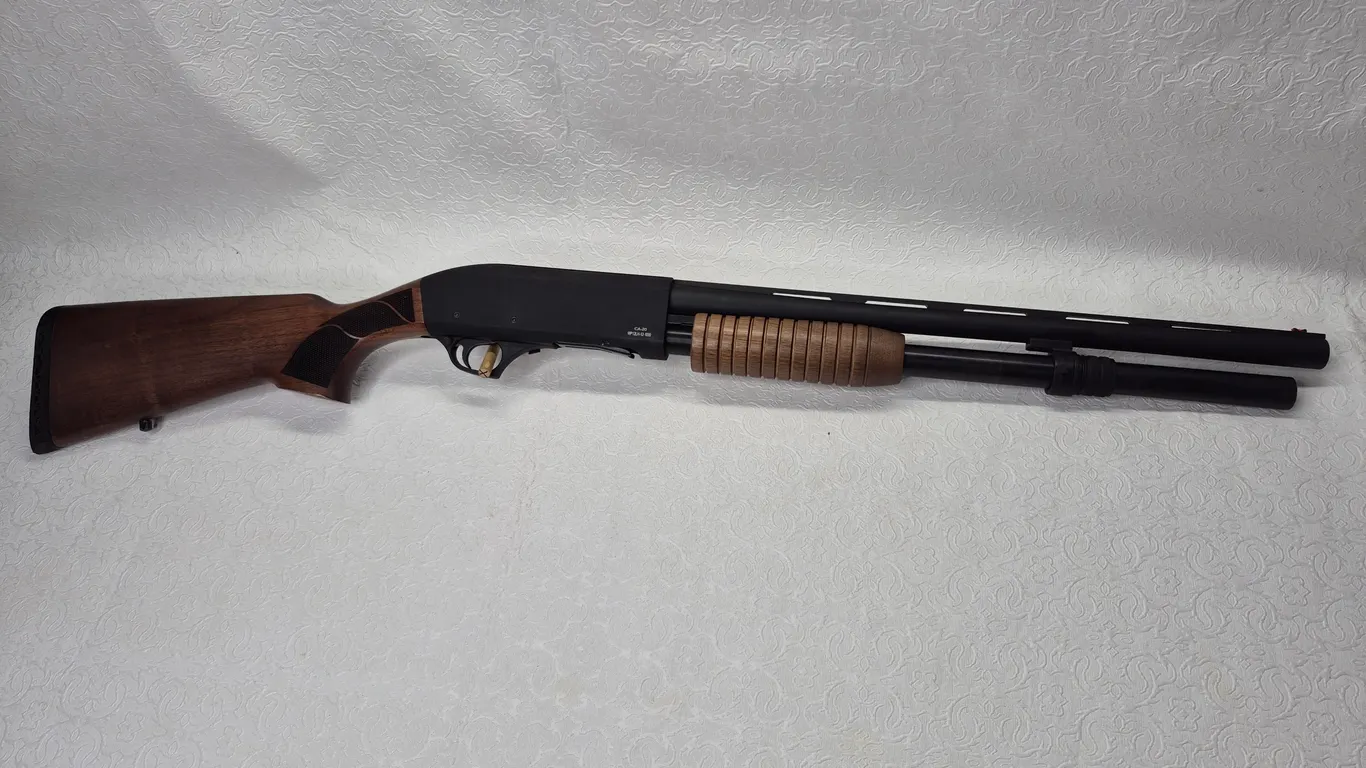 NEW REVOLUTION ARMORY 12 GAU. PUMP ACTION SHOTGUN