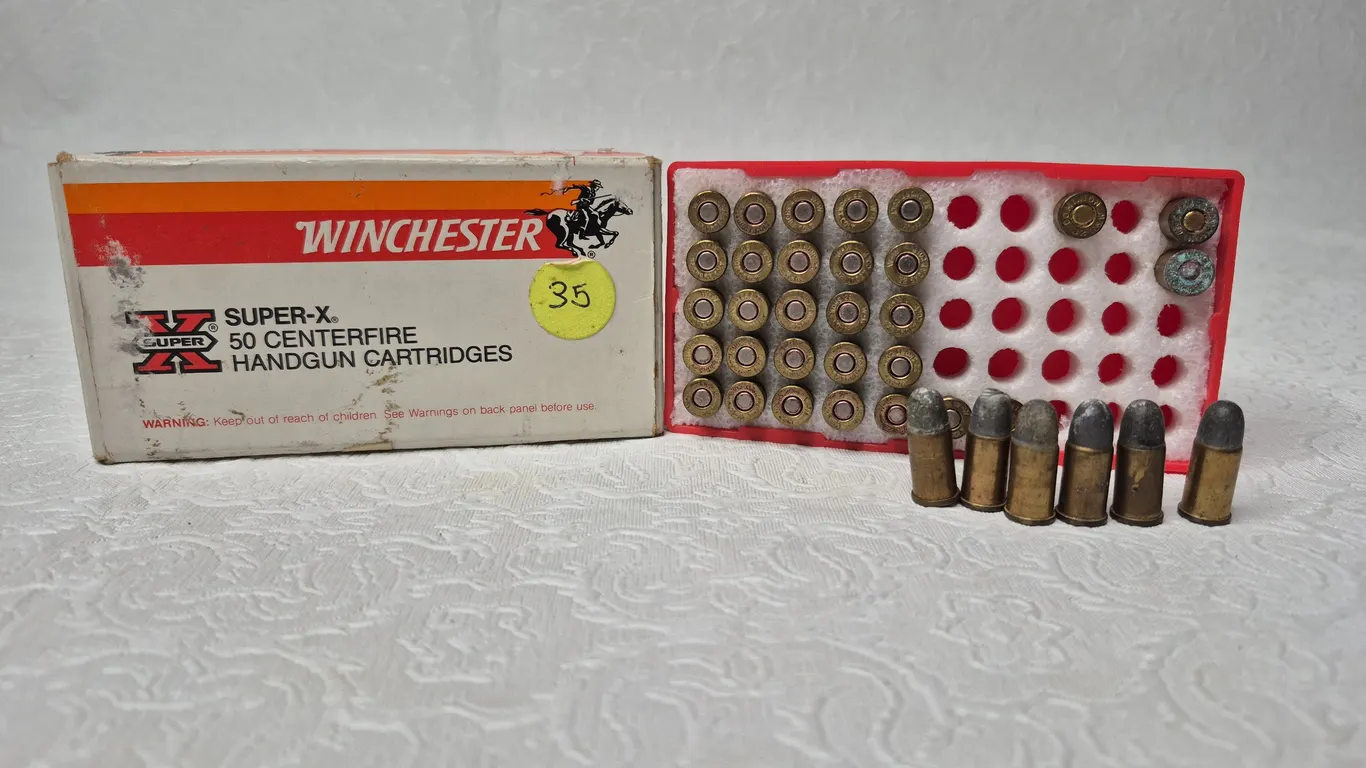 APPROX 35 ROUNDS OF 32 SHOT COLT AMMUNITION