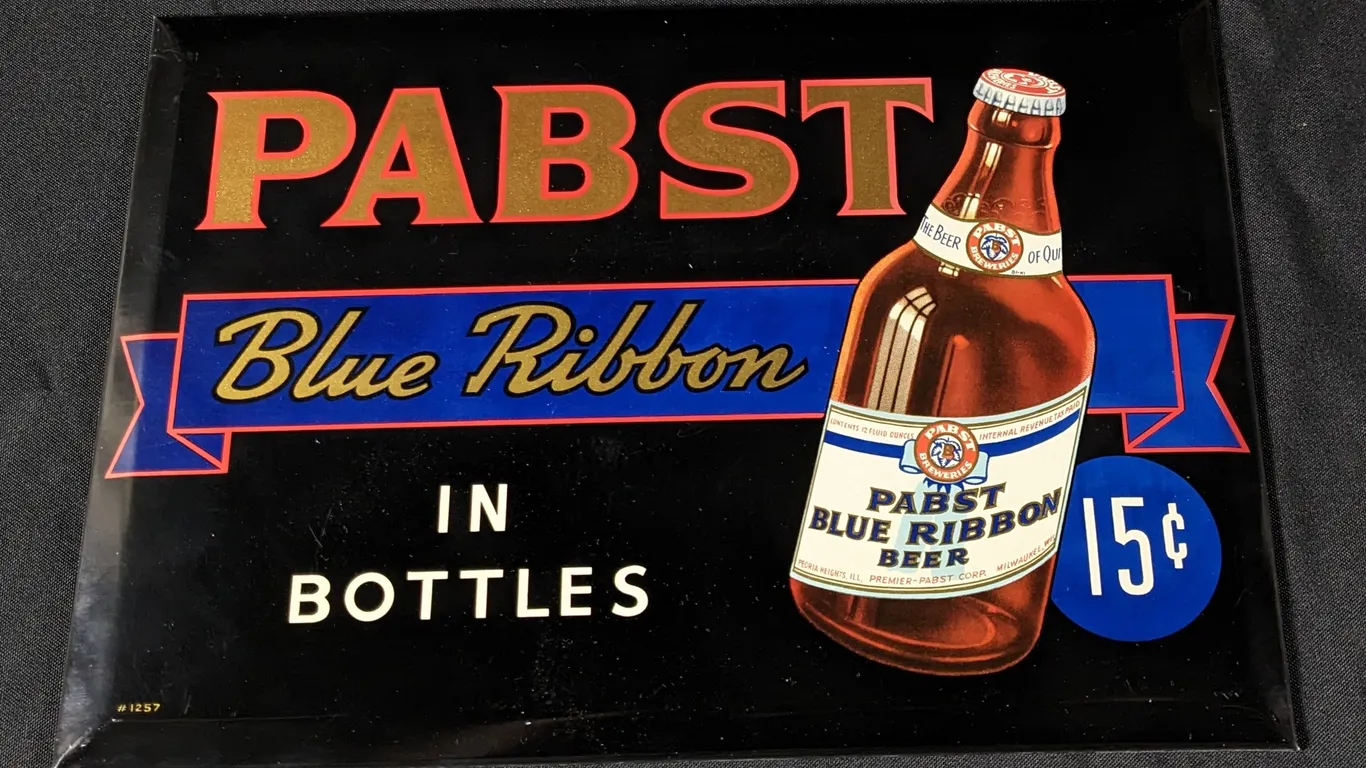 TOC TIN SIGN PABST BLUE RIBBON IN BOTTLES 15¢