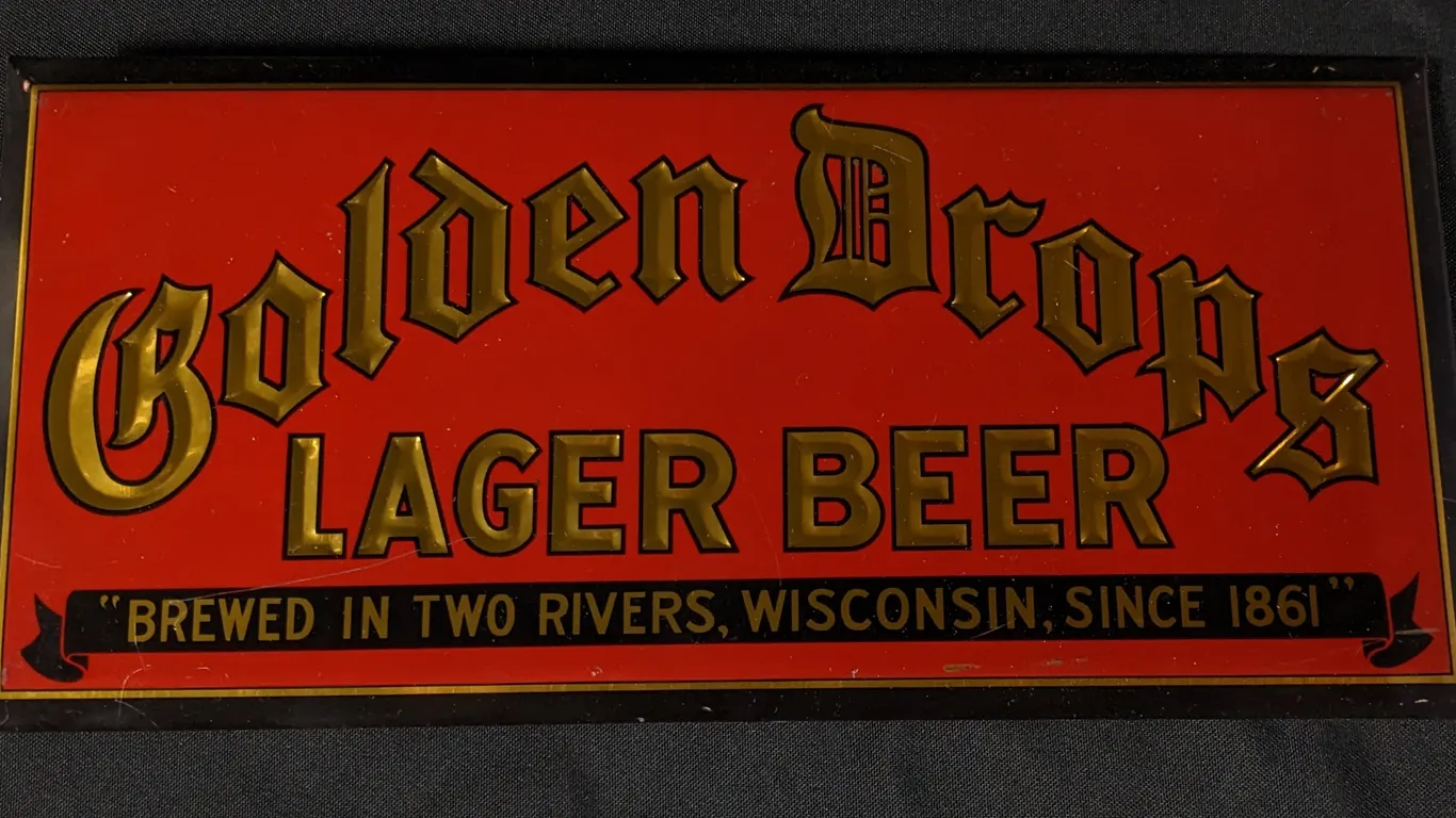 TOC TIN SIGN GOLDEN DROPS LAGER BEER "BREWED IN TWO RIVERS WISCONSIN SINCE 1861"