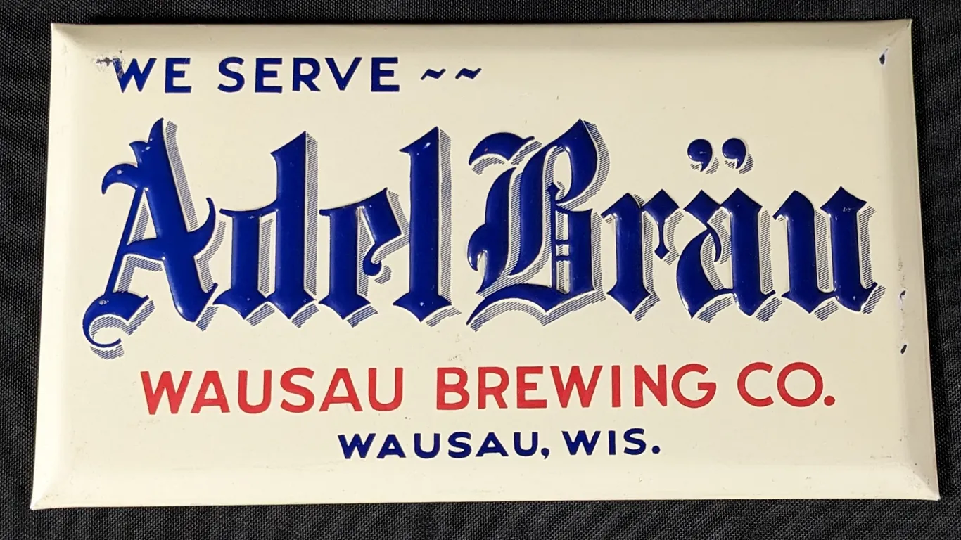 TOC TIN BEER SIGN WE SERVE-- ADEL BRAU WAUSAU BREWING CO WAUSAU WISCONSIN WI