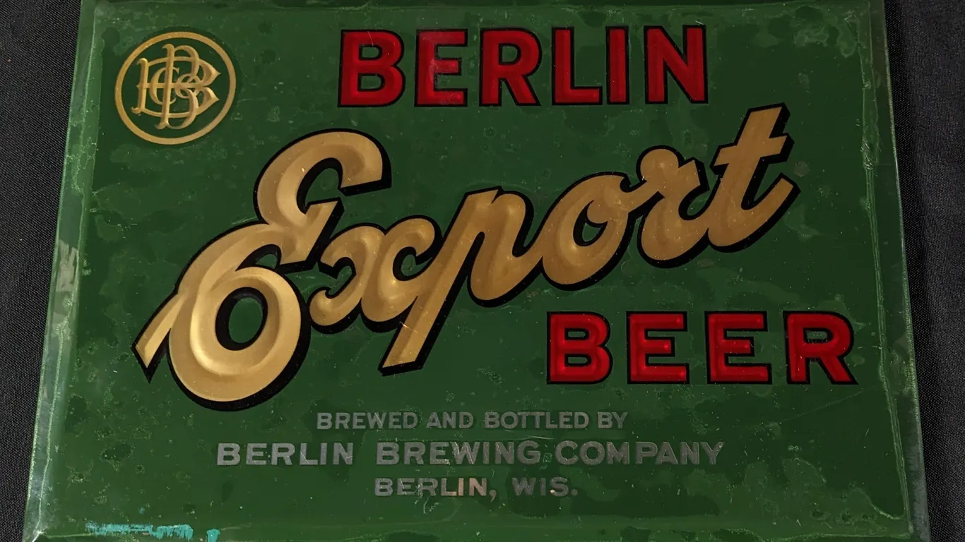 CELLULOID OVER TIN SIGN BERLIN EXPORT BEER BERLIN WISCONSIN