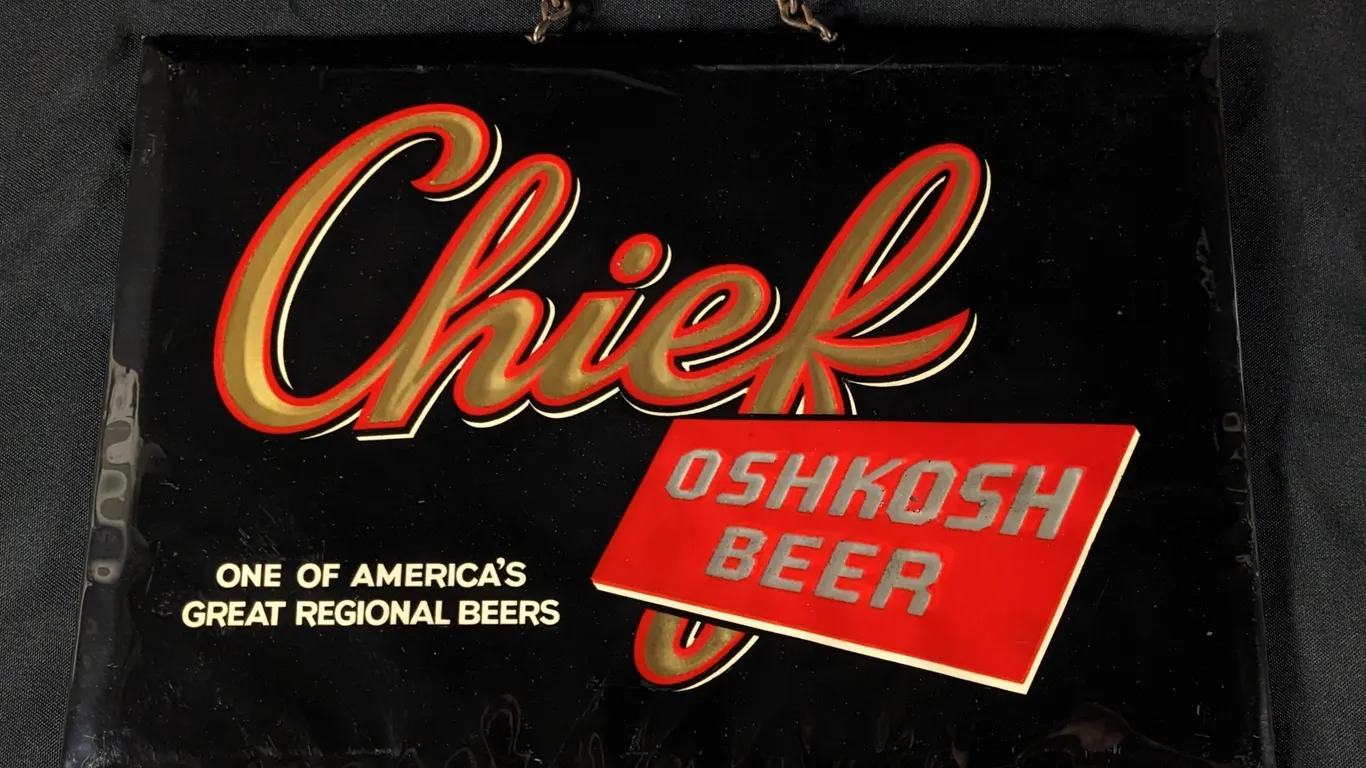 CELLULOID OVER TIN CHIEF OSHKOSH BEER ONE OF AMERICA'S GREAT REGIONAL BEERS WISCONSIN