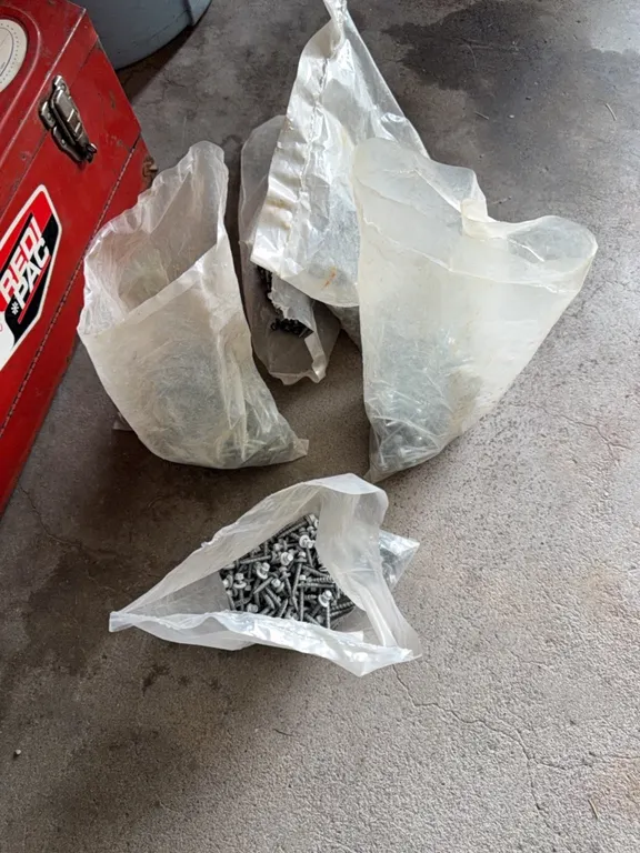 Large supply of screws, several bags full