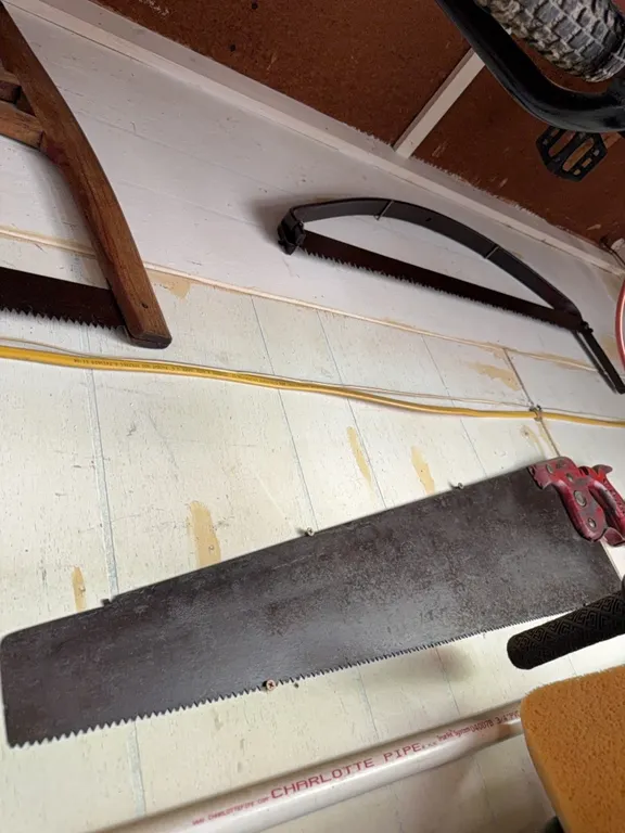 (2) very unique antique saws, winning bidder takes both