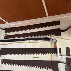 (2) very large wall hanger saws, see photos