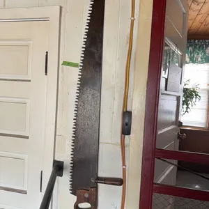 Antique saw, note top wood handle in excellent shape, buying one saw only