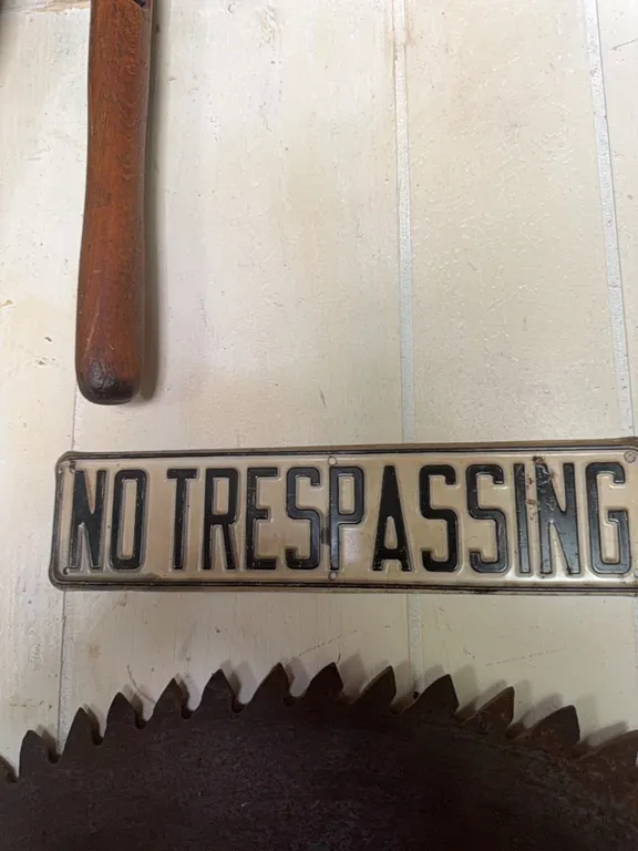 Antique sign, “No trespassing”