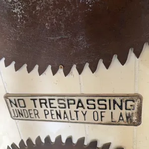 No trespassing sign, antique sign, “under penalty of law”