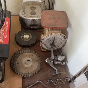 Misc., 100’ tape, saw blades, old scale, fishing reel, plus other.