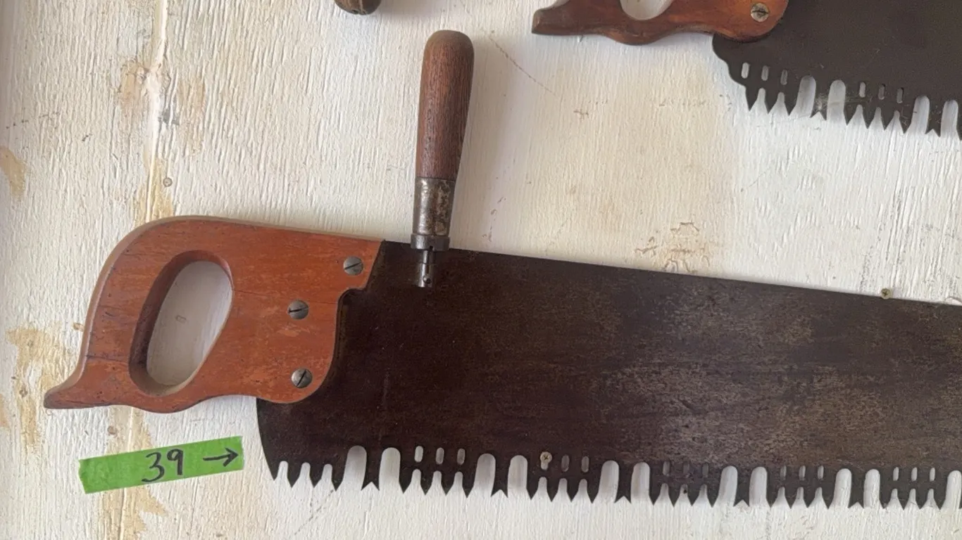 Antique saw with top wooden handle, super nice shape