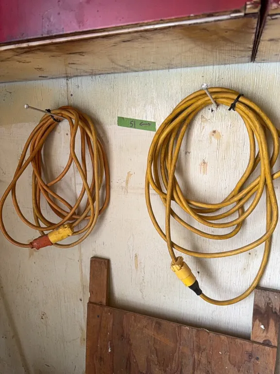 (2) Extension cords, used little, includes light