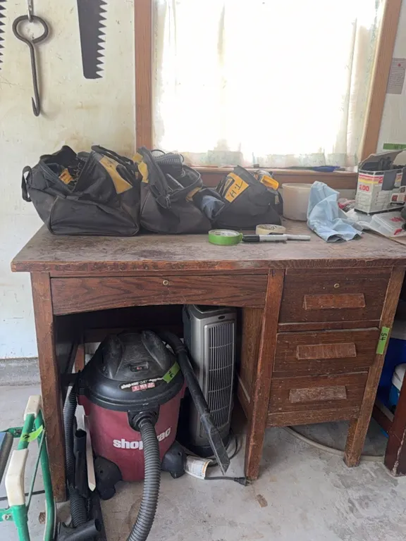 Oak writing desk, drawers are full of bonus items, check photos carefully. Note: you are bidding on the desk and items inside drawers