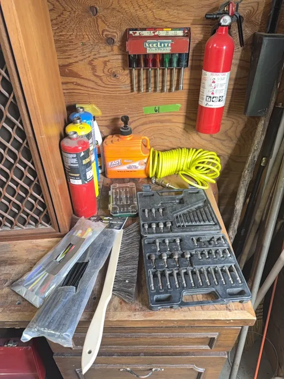 Tools, nut driver set, map gas (full), zip ties, bit sets, fire extinguisher, etc