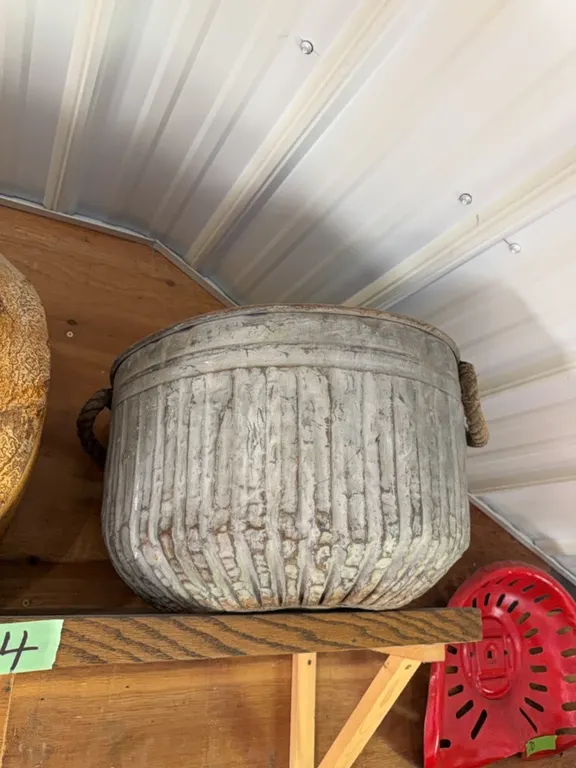 Antique kettle with rope handles, plus others