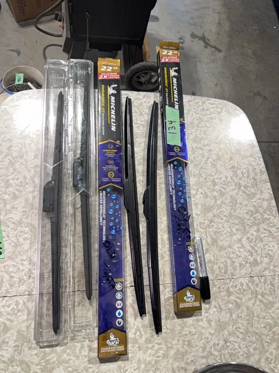 Brand new set of 21 inch wiper blades, also brand new set of 22 inch