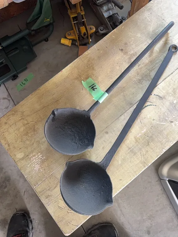 (2) large antique cast-iron ladles