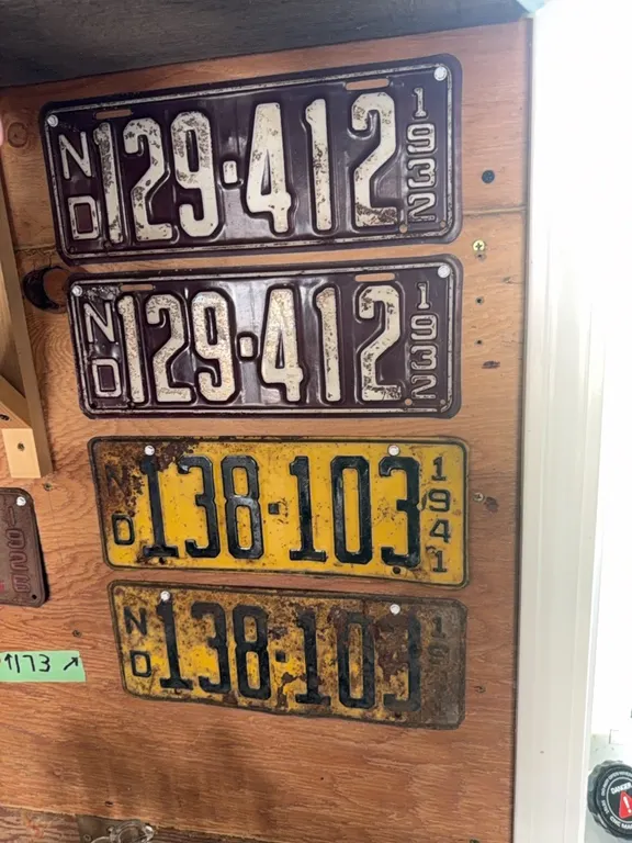 Four hard to find license plates, originals