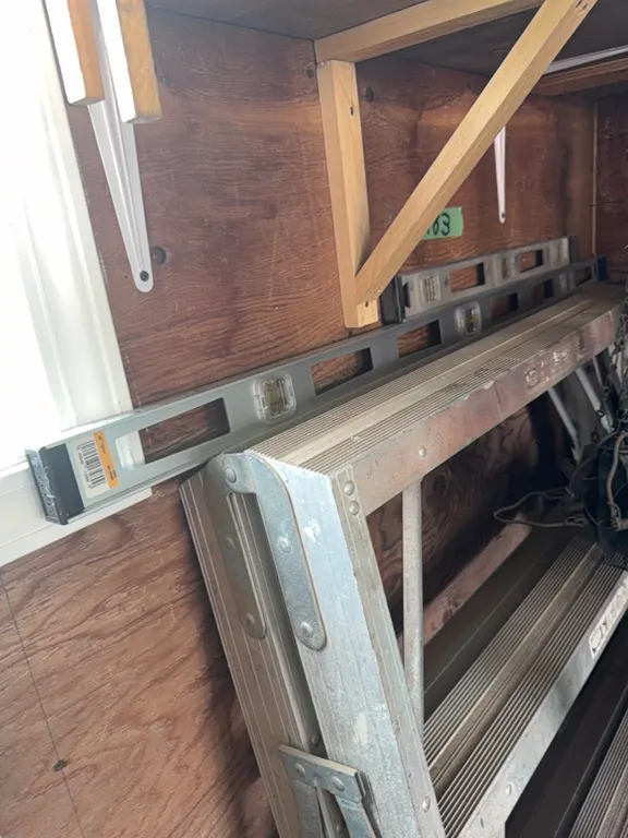 Two aluminum levels, sheet rock square, regular square