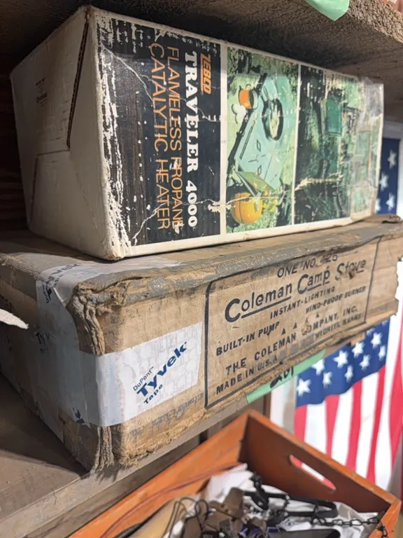 Coleman camp stove, also traveler catalytic heater. Both are in original boxes.