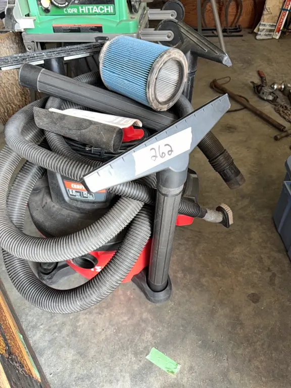 Craftsman 6 hp 12 gallon wet dry vac, excellent condition, extra hose and attachments