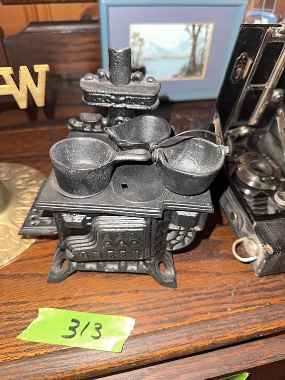 cast iron cookstove and kettles, salesman replica