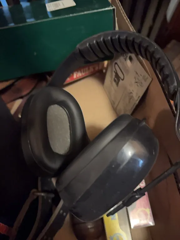 box of straps, callers, rifles scope, head phones/noise canceling, and misc.