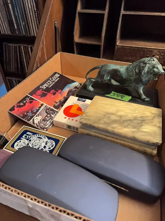 brass lion, marble treasure box, eye glasses, postcards, Langdon centennial playing cards & misc