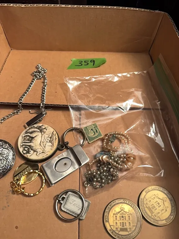 pocket watches, Langdon centennial tokens, money clip, lighter, coin