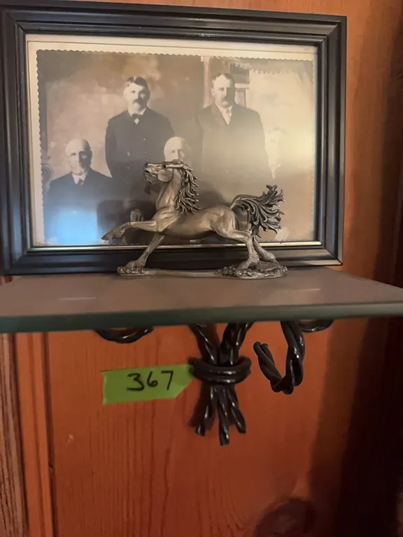 small glass shelf, horse, and old photo