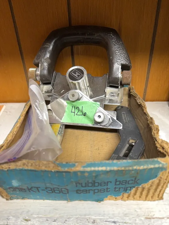 Rubber back carpet trimmer