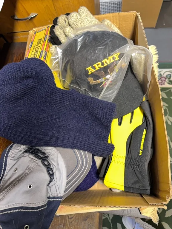 Cigar box, blood pressure cuff, hats and gloves
