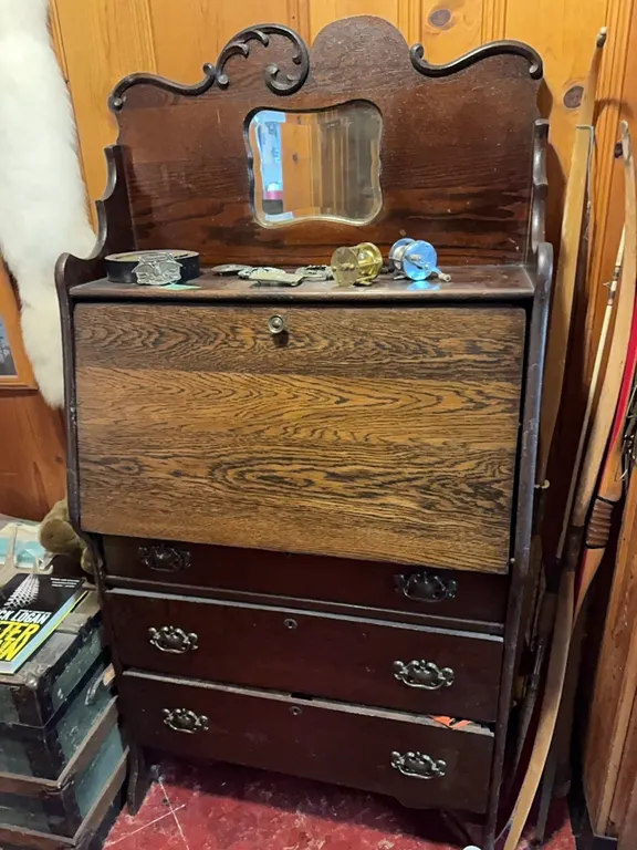 antique secretary and hunting clothing in drawer, old reels, belt buckles all goes, see pictures