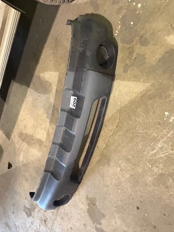 AUTOMOTIVE FRONT BUMPER COVER WITH FOG LIGHTS