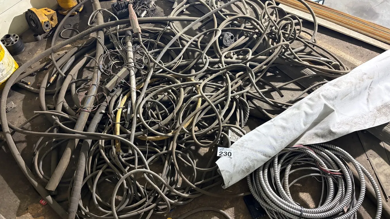 LARGE ASSORTMENT OF HYDRAULIC HOSES, ELECTRICAL CONDUIT, WIRING & HEAVY EQUIPMENT PARTS