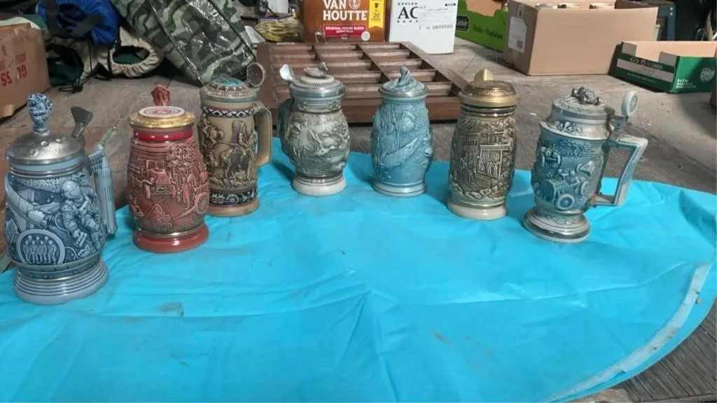 Avon beer steins