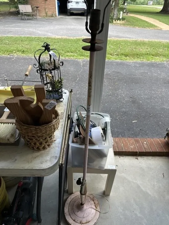 Standup lamp. 4 ft. Condition unknown. No shade.