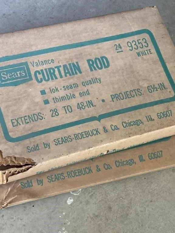 2 boxes. Curtain rods