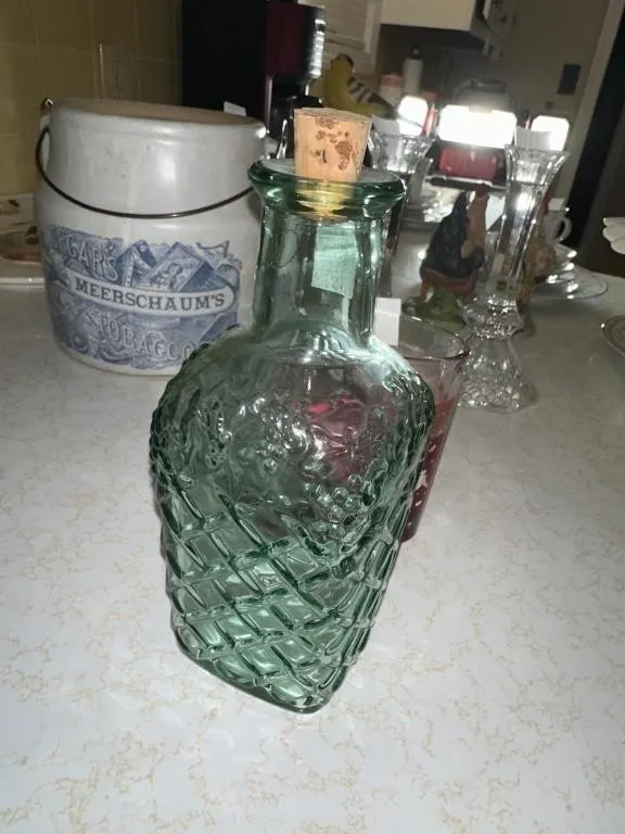 8 in vintage green Libbey glass bottle features a