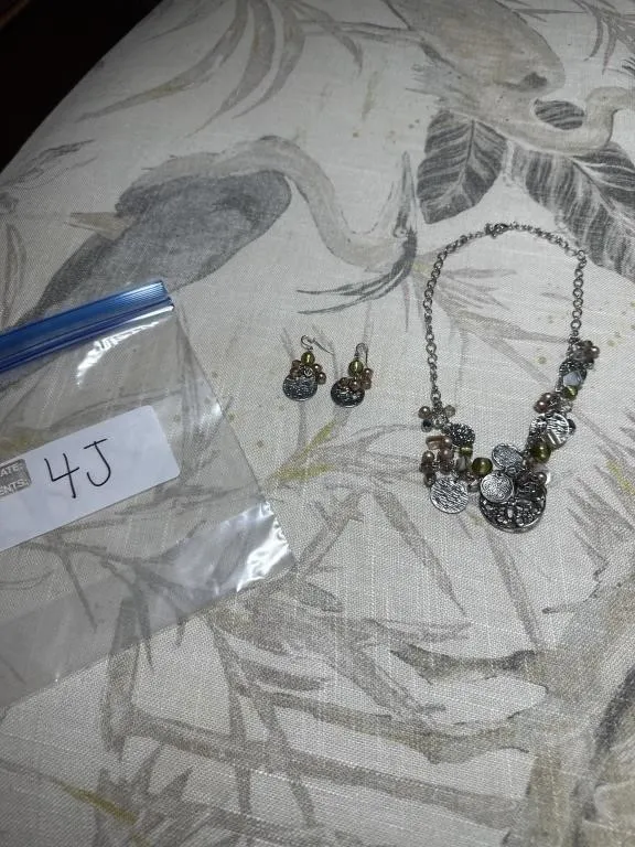 Silver color and green necklace and earrings