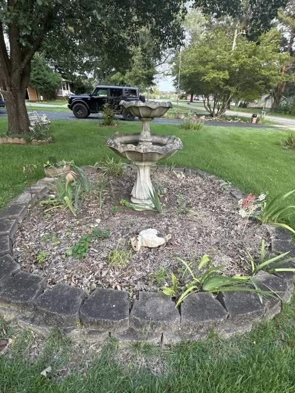 Concrete bird bath flower pots bunnies. Metal