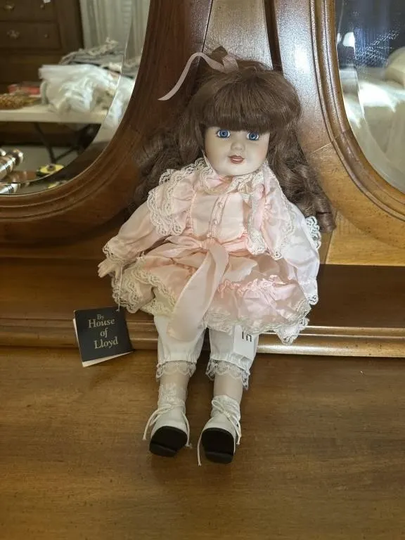 vintage porcelain doll by House of Lloyd features