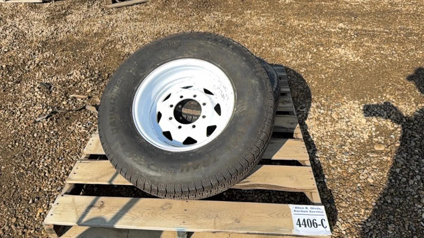 2 - CARLISLE ST235/80R16 TIRES ON 8 BOLT RIMS