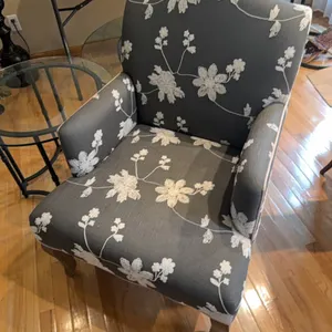 Wing back chair, new condition & sign