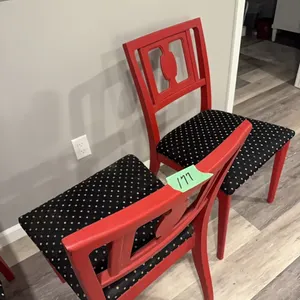 3 red and black chairs