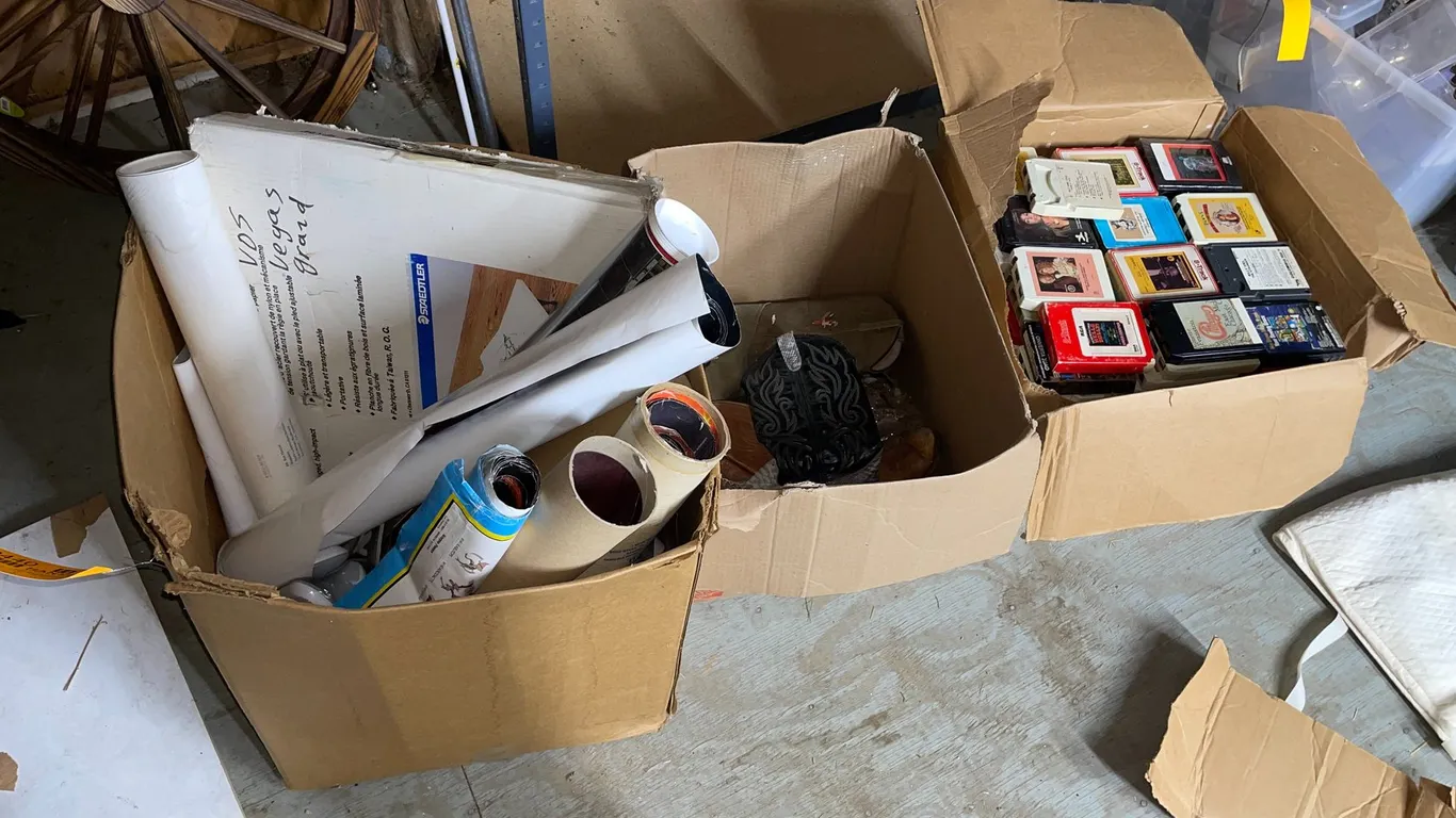 (3) Boxes of Posters, 8-Track Cartridges, and Cowboy Boots