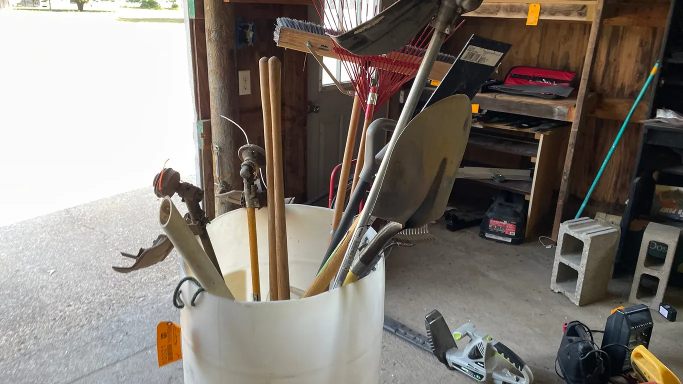 Plastic Barrel of Handled Tools