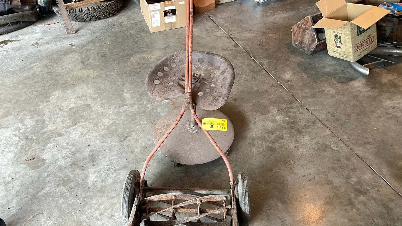 Vintage Push Mower and Tractor Seat Stool on Wheels
