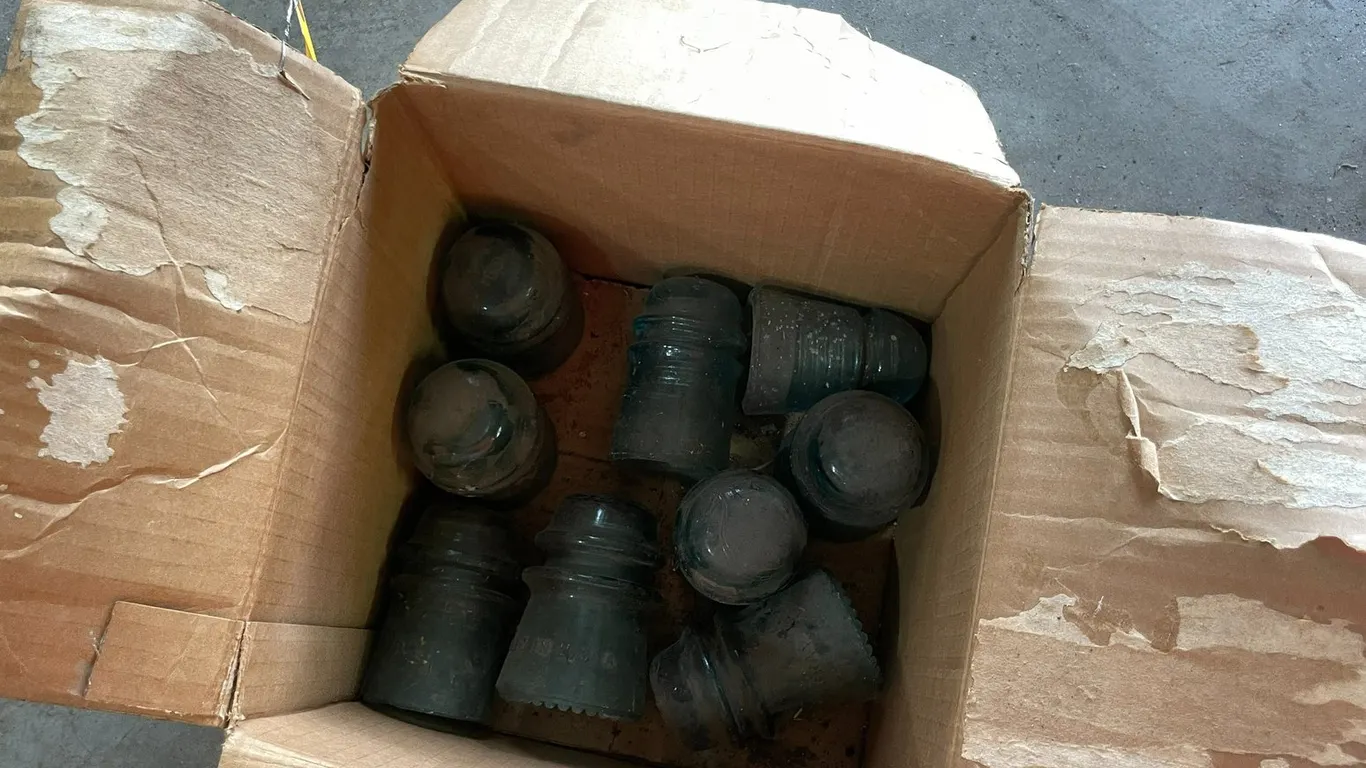 Box of (9) Green Insulators